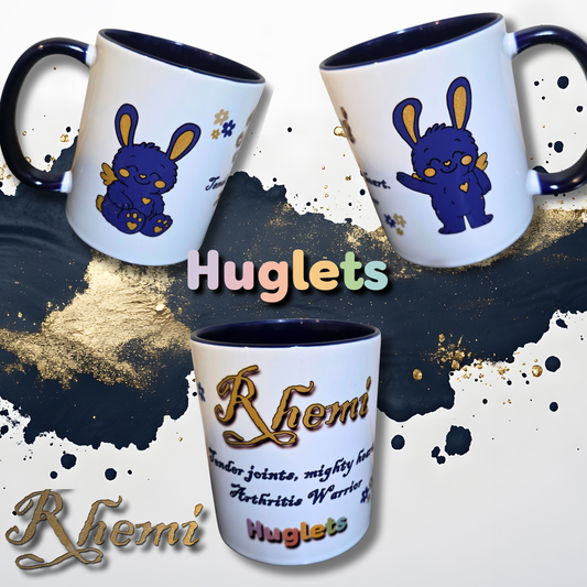 Three mugs with cartoon character and text on a dark background with gold accents, featuring the brand 'Huglets'.