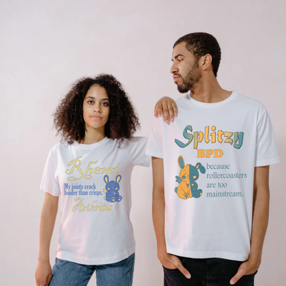 Two people wearing white t-shirts with unique designs and text.